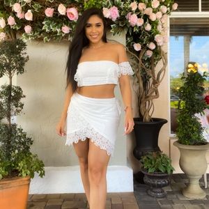 Two pice off shoulder white set (discontinued) - size M. lace material.